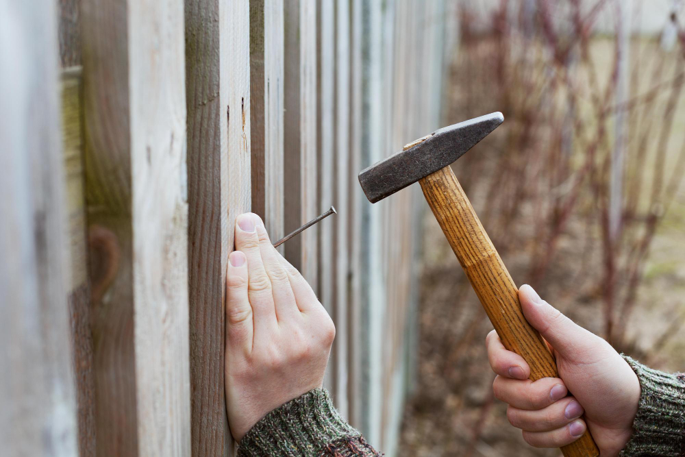 How to Repair a Wood Fence